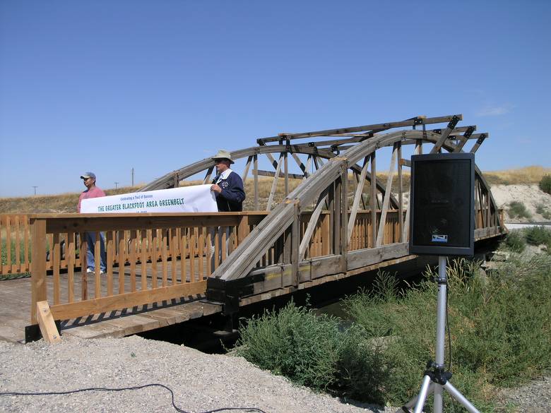 Greenbelt Bridge / Constructed with TWII lumber and reclaimed trusses